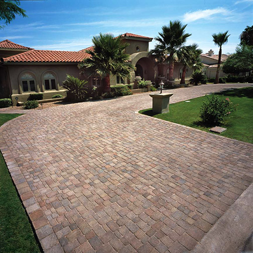  Tumbled Standard pavers in a curver driveway. the color is our redis El Norte blend