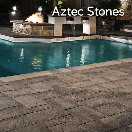 Aztec Pavers as a pool patio in slate. Aztec Stones are molded with sudo-stone rough finish
